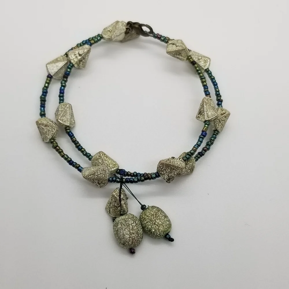oil slick seed beed and silver wrap bracelet